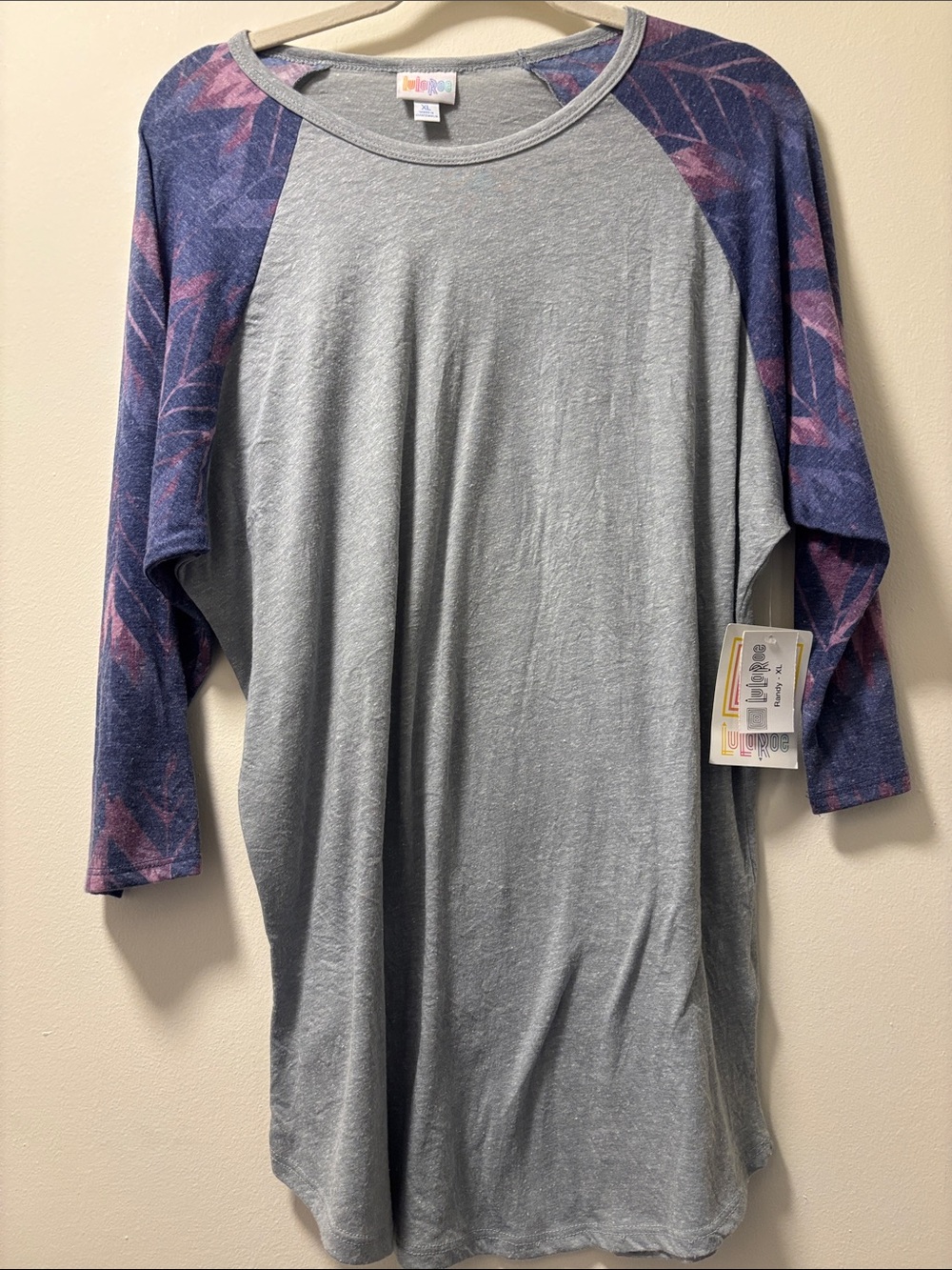 LuLaRoe Heather Gray Raglan with Blue and Purple Leaf-Print Sleeves